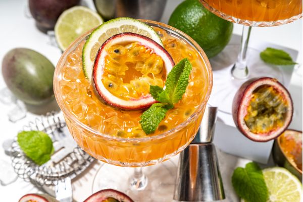 Add fresh peppermint leaves and lime slices to make passion fruit tea look fancy