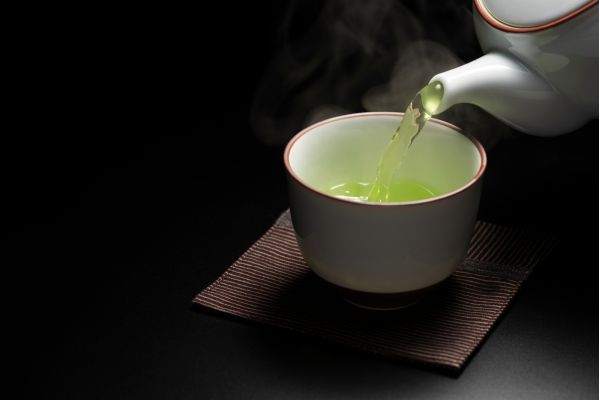 a cup of hot green tea