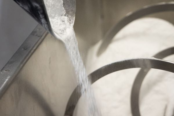Powder can stick to the containers’ surface